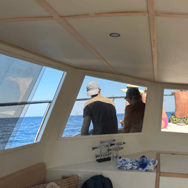 Mondello: Tour in barca della costa di 4 ore con aperitivo e bagno