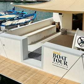 Mondello: Tour in barca della costa di 4 ore con aperitivo e bagno